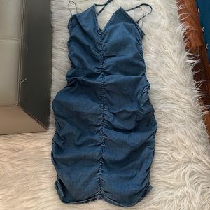 Light Blue Denim elastic mini dress. Brand new, never been worn.